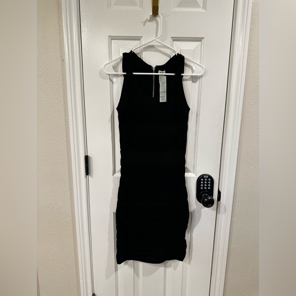 NWT Cache Fitted Mini
